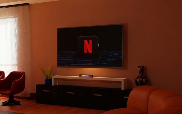 The Evolution of Streaming Services a living room with a flat screen tv on the wall