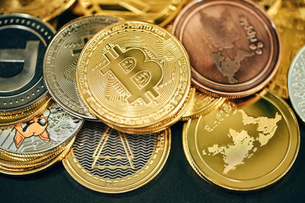 Understanding Cryptocurrency and Blockchain a pile of gold and silver bitcoins