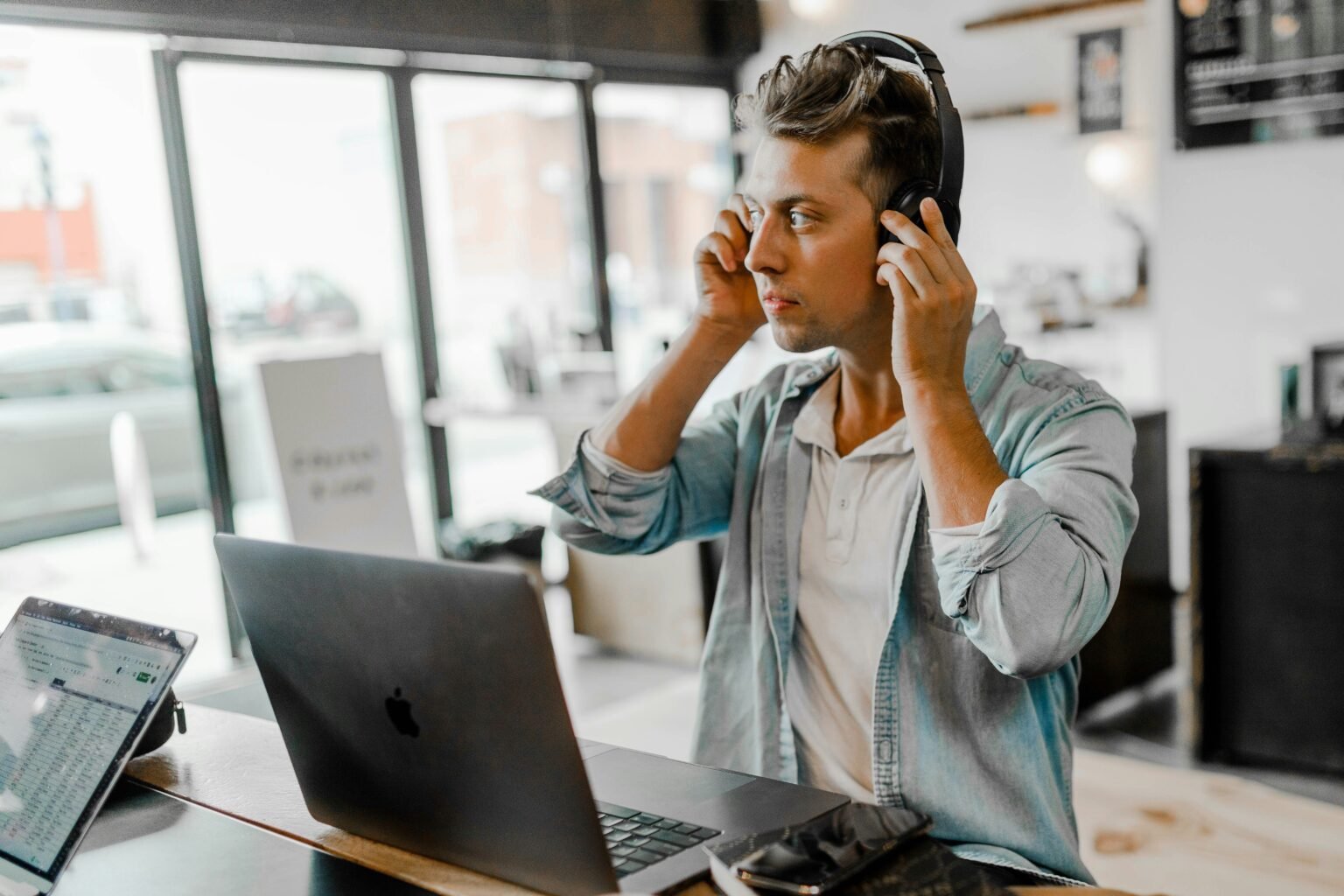 Essential Tips for Scaling Your Startup men's blue collared top near silver MacBook